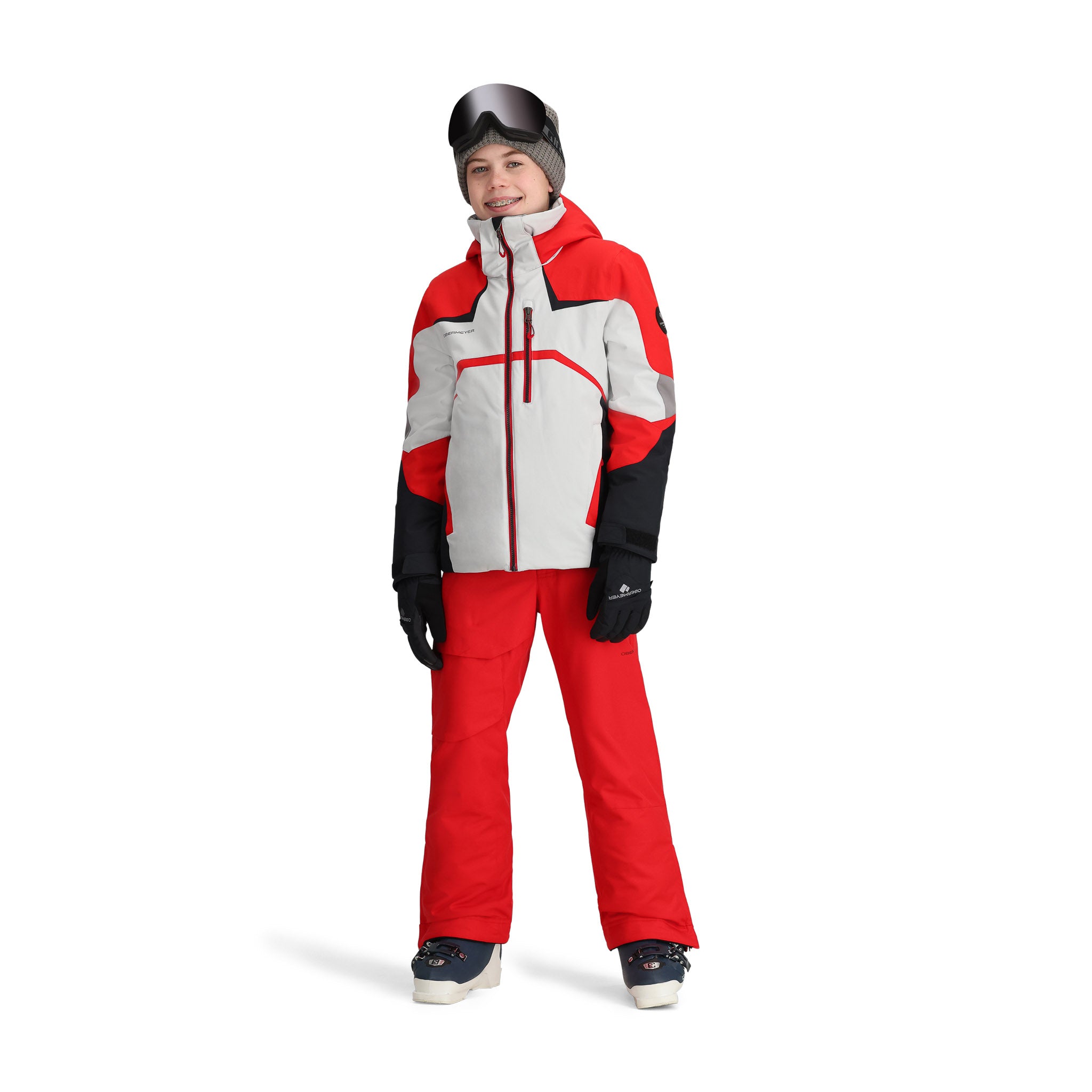 Obermeyer Juniors Mach 15 Insulated Jacket - A red, white, and black insulated jacket with a hood, zippered pockets, and a zipper down the front.