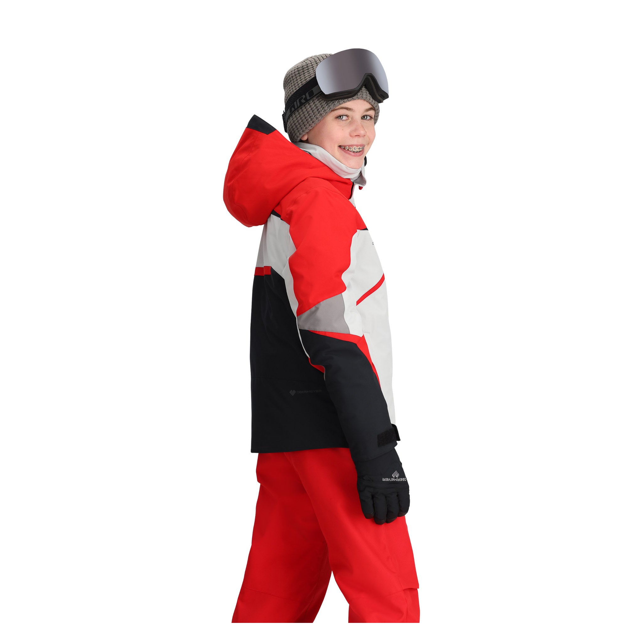 Obermeyer Juniors Mach 15 Insulated Jacket 2025 - A red, black, and grey insulated jacket with a hood, featuring a white zipper and two zippered pockets on the front.
