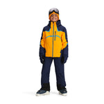 Obermeyer Juniors Mach 15 Insulated Jacket - A navy blue and orange jacket with a hood, zippered pockets, and a white logo on the left chest.