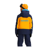 Obermeyer Juniors Mach 15 Insulated Jacket 2025 - A navy blue and orange insulated jacket with a hood, featuring a zippered front and two side pockets.
