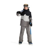 Obermeyer Junior's Axel Insulated Jacket - A black, white and grey jacket with a zippered chest pocket on the right side.
