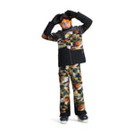 Obermeyer Junior's Axel Insulated Jacket 2025 - A black jacket with a white and orange snowflake pattern on the chest, worn by a model posing in front of a snowy background.