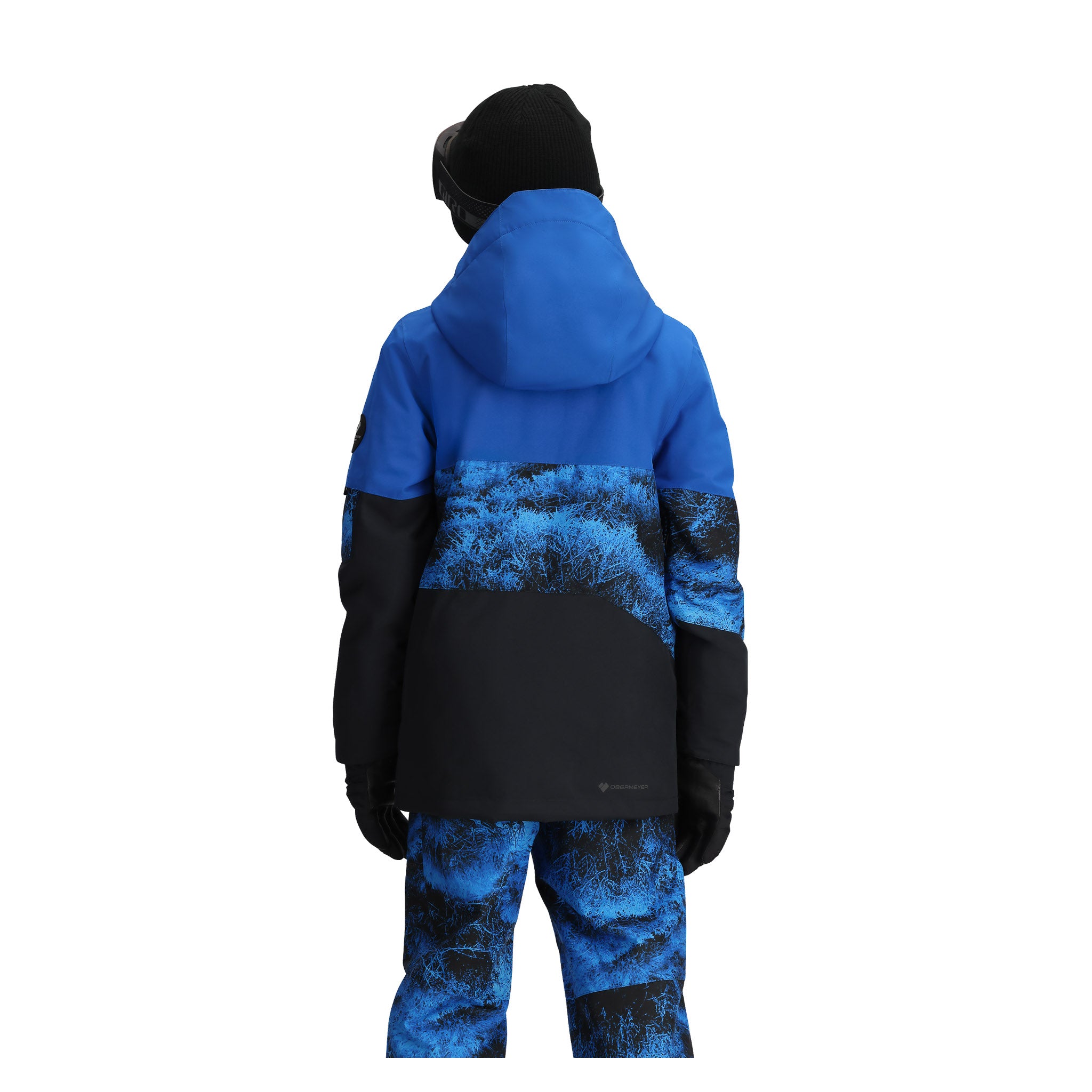 Obermeyer Junior's Axel Insulated Jacket 2025 - A blue and black insulated jacket with a hood, featuring a snowflake pattern on the chest and sleeve cuffs.