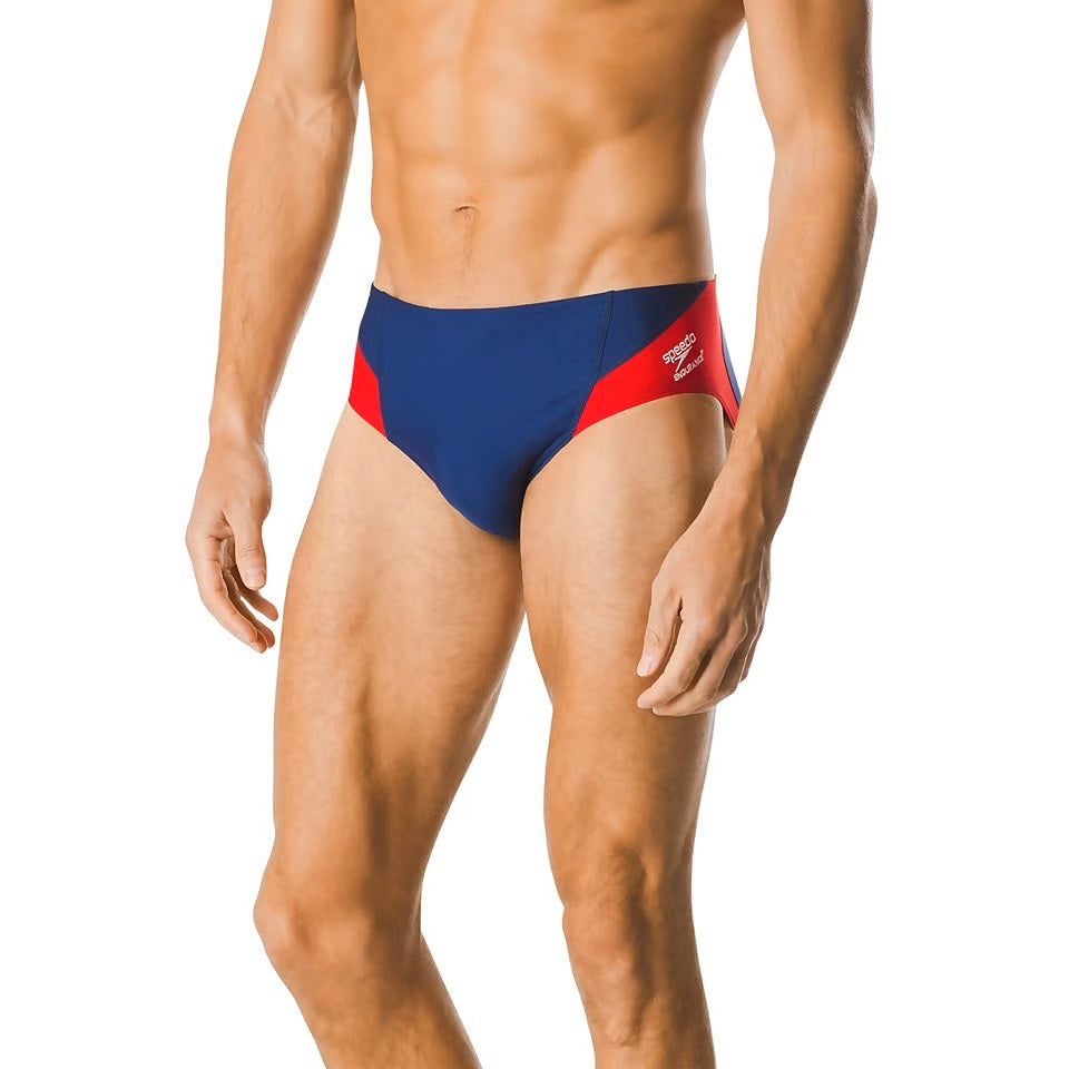 Speedo Spark Splice Brief Swimsuit - A navy blue swimsuit with red and white diagonal stripes on the front.