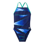 Speedo Infinite Pulse Crossback One Piece Swimsuit - A dark blue swimsuit with a geometric pattern of light blue and white triangles, featuring green accents along the edges.