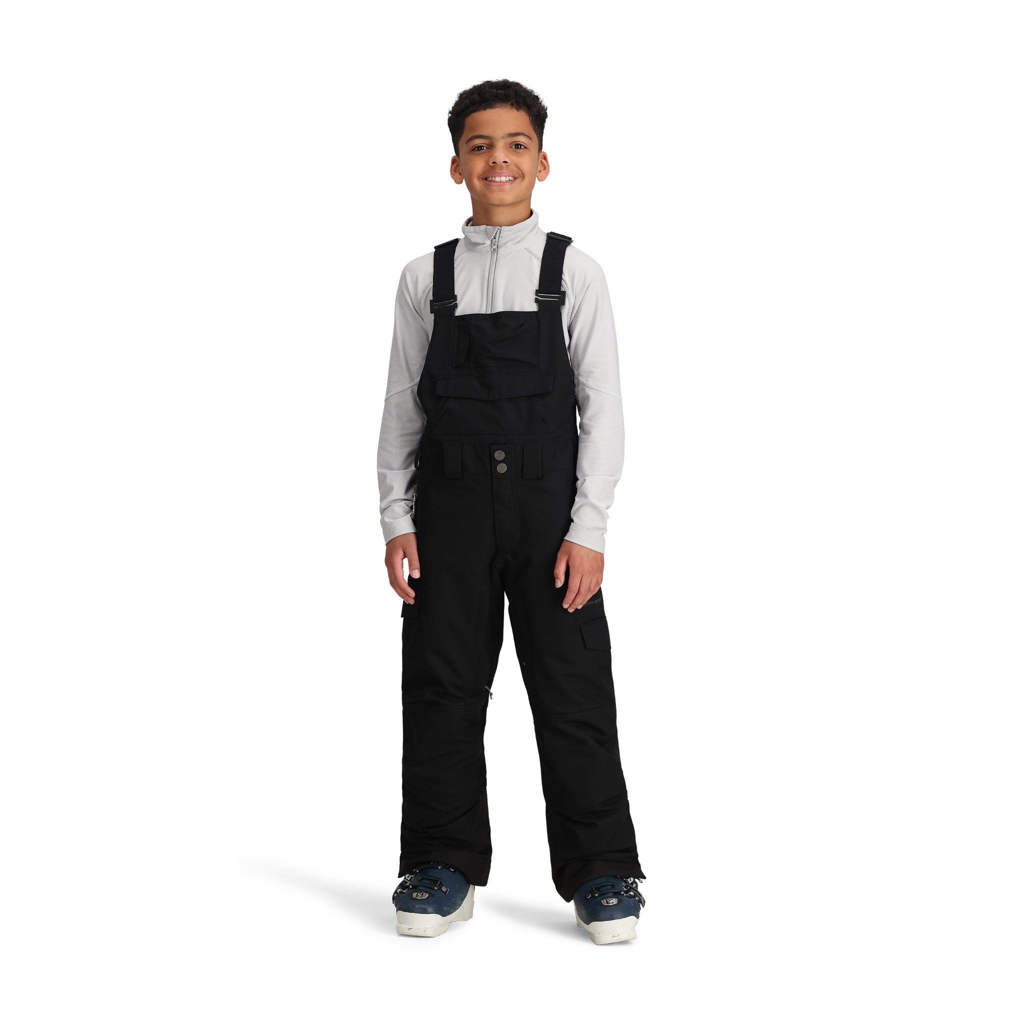Obermeyer Junior's Carver Bib Pant 2025 - Black bib pants with adjustable straps and zippered pockets.