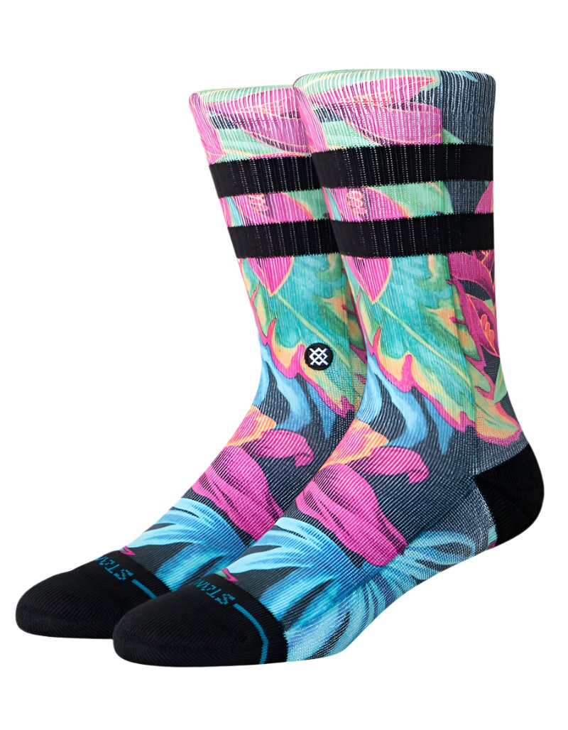Stance Gloww Poly Crew Socks 2025 - A pair of crew socks in a vibrant, neon-colored design with a repeating pattern of abstract shapes and lines.