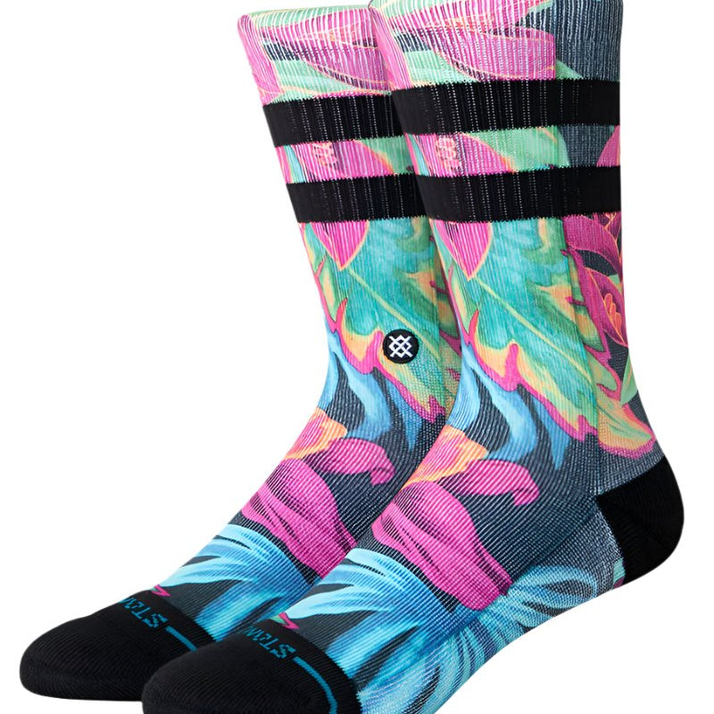 Stance Gloww Poly Crew Socks 2025 - A pair of crew socks in a vibrant, neon-colored design with a repeating pattern of abstract shapes and lines.