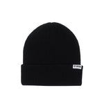Union Low Cuff Beanie 2025 - A black beanie with a white label on the cuff featuring the word "UNION" in black letters.