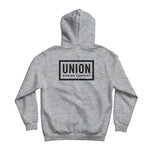 Union Team Hoodie 2025 - A light gray hoodie with a black logo on the chest that says "UNION" in bold letters, outlined by a thin white border.