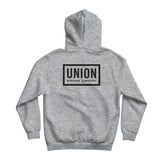 Union Team Hoodie 2025 - A light gray hoodie with a black logo on the chest that says "UNION" in bold letters, outlined by a thin white border.