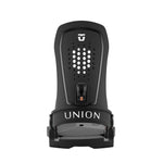 Union Women's Trilogy Snowboard Binding 2025 - A black snowboard binding with a white logo on top and a copper-colored metal piece in the middle.