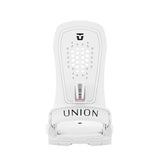 Union Women's Trilogy Snowboard Binding 2025 - A white snowboard binding with a black logo at the top and a small copper-colored metal piece in the middle of the baseplate.