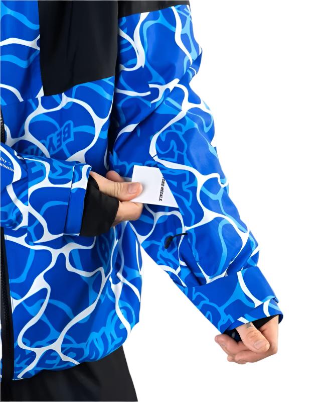 Beyond Medals Fullzip Insulated Jacket 2025 - A blue and white abstract patterned jacket with a black collar and cuffs.