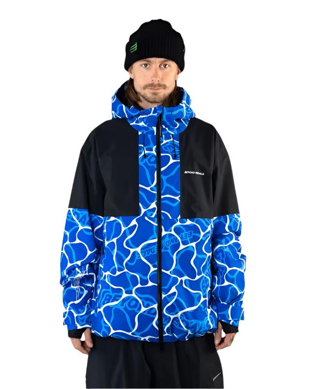 Beyond Medals Fullzip Insulated Jacket 2025 - A blue and white abstract patterned jacket with a black chest pocket on a model wearing it.