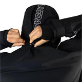 Beyond Medals Fullzip Insulated Jacket 2025 - A black jacket with white lettering on the sleeve and a zipper running down the front.