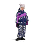 Obermeyer Junior's Carnia Insulated Jacket - A navy blue jacket with a purple stripe and white snowflake pattern on the chest, featuring a hood and zipper closure.