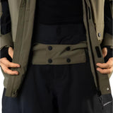 Beyond Medals Cargo Shell 2L Jacket 2025 - A khaki-colored jacket with a black zipper and two chest pockets, featuring a cargo pocket on one side.