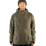 Beyond Medals Cargo Shell 2L Jacket 2025 - A khaki green jacket with multiple cargo pockets and a hood.
