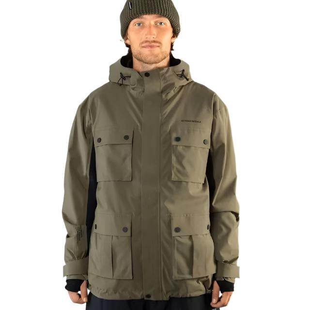Beyond Medals Cargo Shell 2L Jacket 2025 - A khaki green jacket with multiple cargo pockets and a hood.