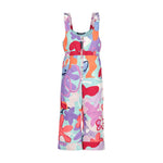 Obermeyer Junior's Snoverall Insulated Print Bib 2025 - A colorful overall with a print of abstract shapes in shades of purple, orange, and red on a light blue background.