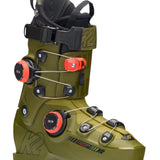 The K2 Cortex 130 Zonal BOA ski boots are displayed prominently against a white background. The boots feature a camouflage design with black straps and buckles, providing a secure fit for the wearer.