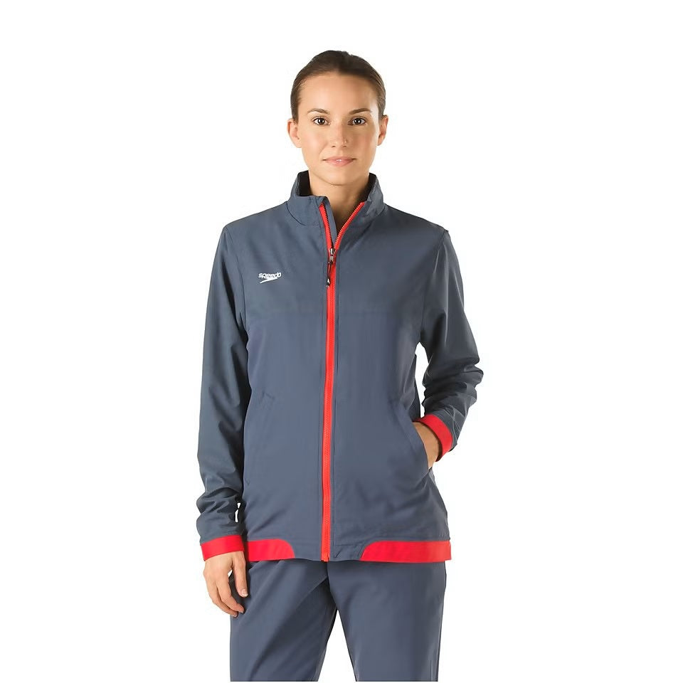 Speedo Female Tech Warm Up Jacket - A navy blue jacket with a white logo on the left chest and two zippered pockets at the waist.