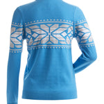 Nils Women's Thredbo 1/4 Zip Sweater - A light blue sweater with a geometric pattern on the chest and sleeves, featuring a quarter zip closure at the front.