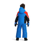 Obermeyer Junior's Super G Insulated Jacket 2025 - A blue and red insulated jacket with a hood, featuring white stripes on the sleeves.
