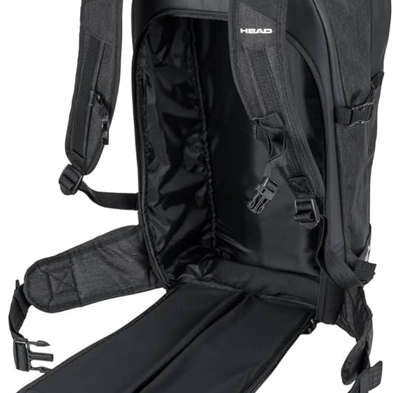 Head Kore Backpack 2023 - Black backpack with yellow zipper pull on top right side.
