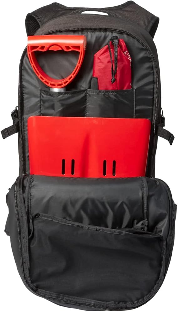 Head Kore Backpack 2023 - Black backpack with a zippered front pocket and two side pockets, featuring a black strap and a small white logo on the top.