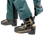 Dynafit Ridge Pro 120 Alpine Touring Boot 2025 - Black boot with gold accents and a circular logo on the side.