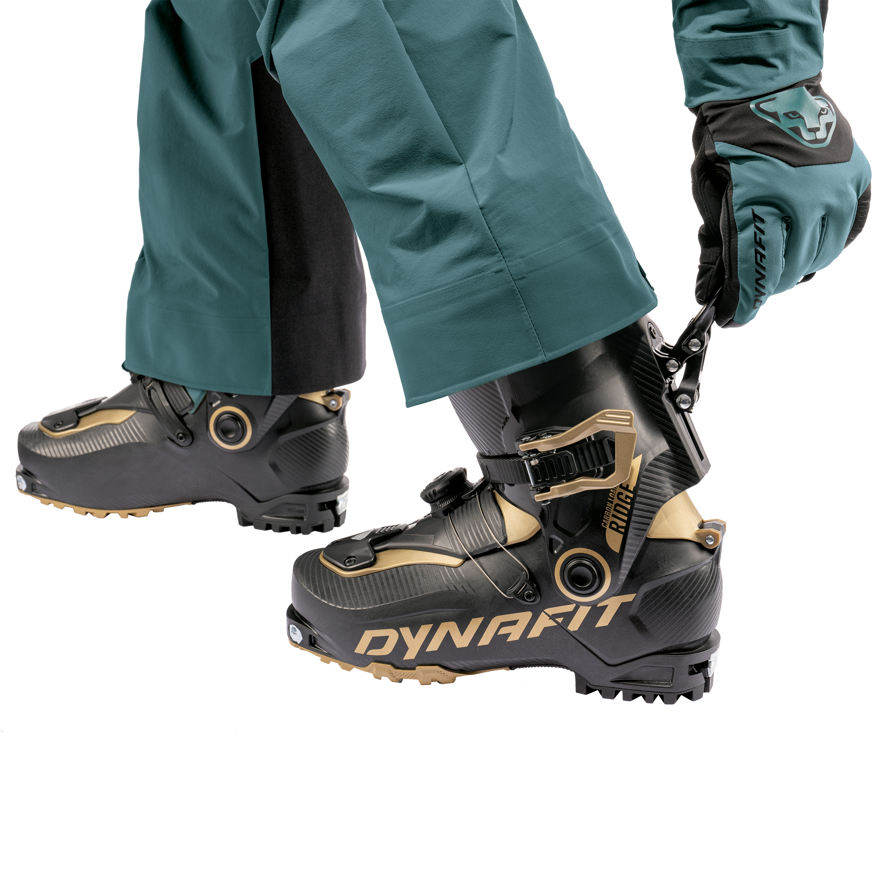Dynafit Ridge Pro 120 Alpine Touring Boot 2025 - Black boot with gold accents and a circular logo on the side.