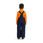Obermeyer Junior's Volt Insulated Pant 2025 - A pair of navy blue insulated ski pants with a white logo on the left leg and adjustable straps at the waist.