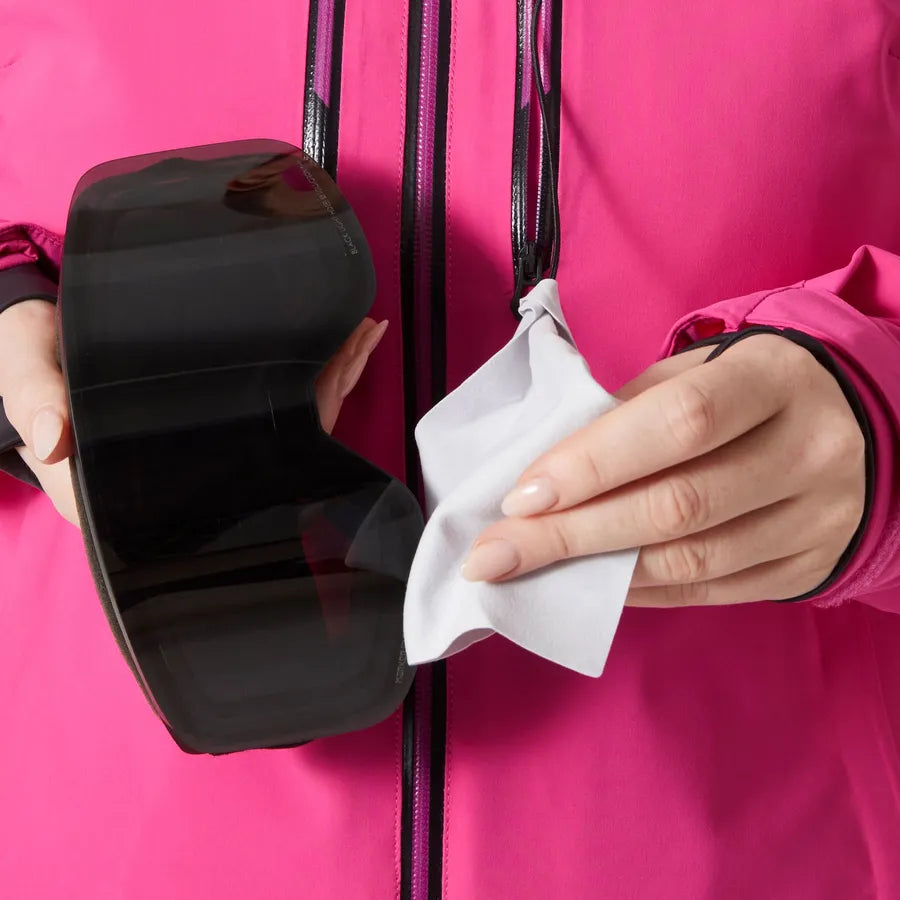 Helly Hansen Women's Alphelia Lifaloft Jacket - A black jacket with a shiny, reflective material on the front and sleeves.