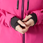 Helly Hansen Women's Alphelia Lifaloft Jacket - A bright pink jacket with a black zipper and two zippered pockets on either side of the chest.