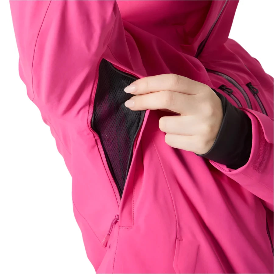 Helly Hansen Women's Alphelia Lifaloft Jacket - A woman's pink jacket with a black zipper and black drawstring at the waist, featuring a zippered chest pocket and two side pockets.
