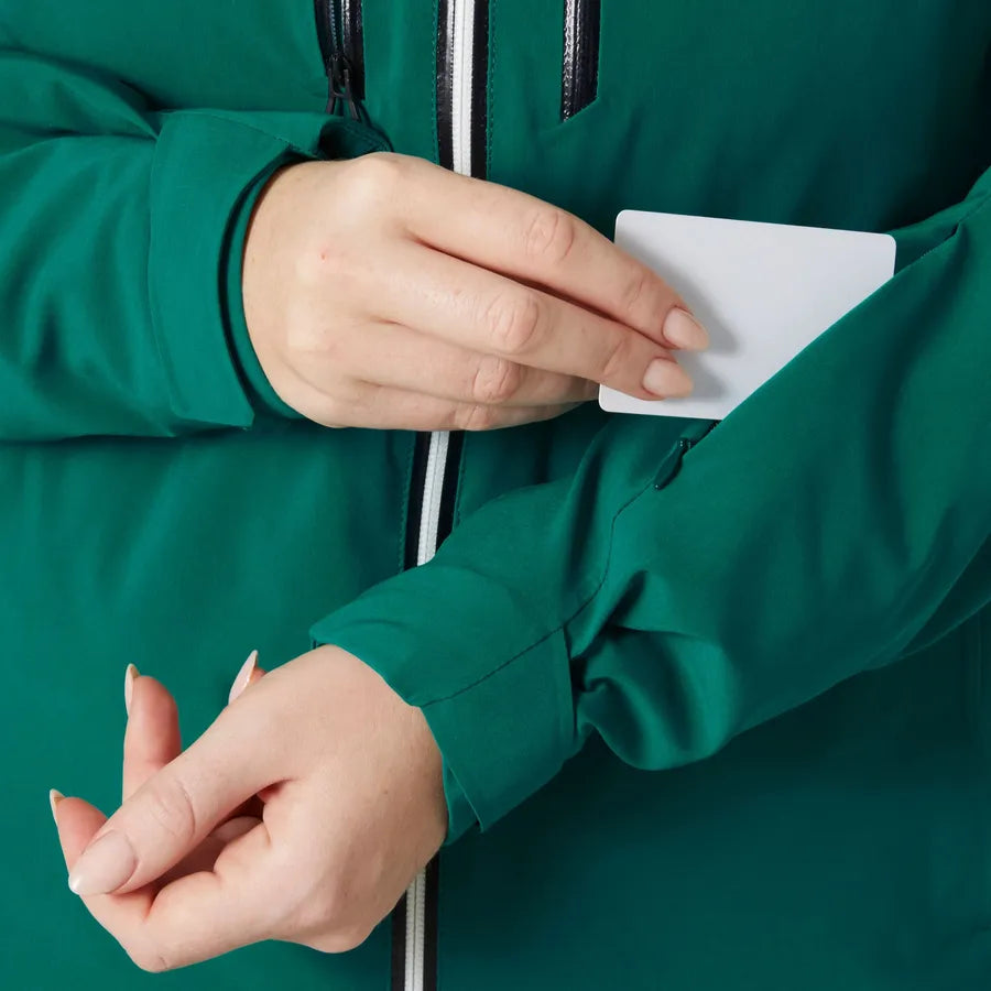 Helly Hansen Women's Alphelia Lifaloft Jacket - A forest green jacket with a black zipper and white trim.