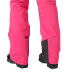 Helly Hansen Women's Legendary Insulated Pant 2025 - A pair of bright pink snow pants with a black logo on the left leg and black trim at the bottom.