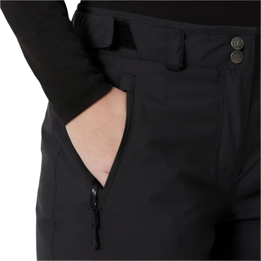 Helly Hansen Women's Legendary Insulated Pant 2025 - Black insulated ski pants with a zippered pocket on the right thigh.