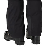 Helly Hansen Women's Legendary Insulated Pant 2025 - Black insulated ski pants with a subtle logo on the left thigh and zippered pockets at the back.