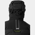 Helly Hansen Women's Avanti Insulated Jacket - A black insulated jacket with a hood, featuring a zippered front and two pockets on either side.