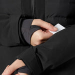 Helly Hansen Women's Avanti Insulated Jacket - A black insulated jacket with a zippered chest pocket and two zippered side pockets.
