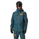 Helly Hansen Garbaldi 2.0 Insulated Jacket - A dark blue jacket with a hood, zippered pockets, and an orange logo on the left chest.