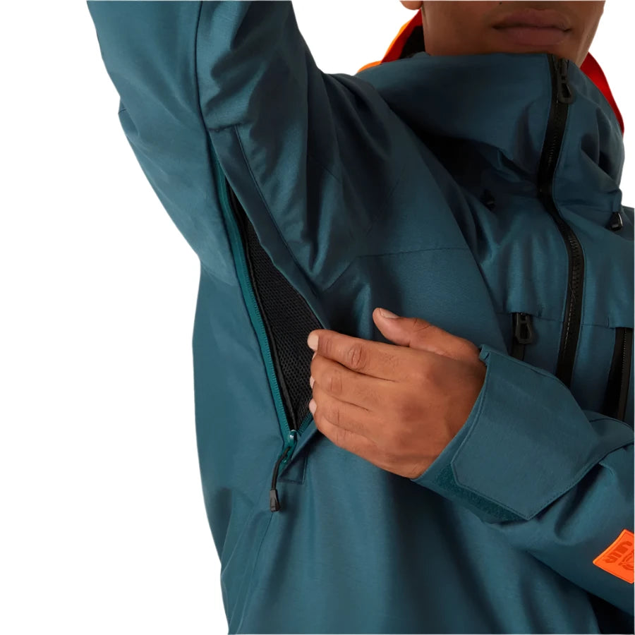 Helly Hansen Garbaldi 2.0 Insulated Jacket - A dark teal jacket with a red zipper and black hardware, featuring a zippered chest pocket on the right side.