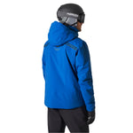 Helly Hansen Alpha Infinity Insulated Jacket 2025 - A blue jacket with a hood, featuring two black stripes on each shoulder and a white logo on the upper back.