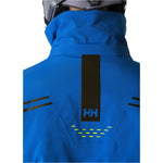 Helly Hansen Alpha Infinity Insulated Jacket 2025 - A royal blue jacket with a black logo on the back and two zippered pockets on either side.