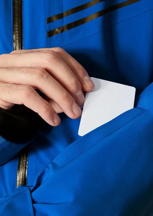 Helly Hansen Alpha Infinity Insulated Jacket - A royal blue jacket with a black zipper and two black stripes on the chest.