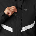 Helly Hansen Women's Edge 3.0 Insulated Jacket - A black jacket with a white logo on the left chest and a zipper running down the front.