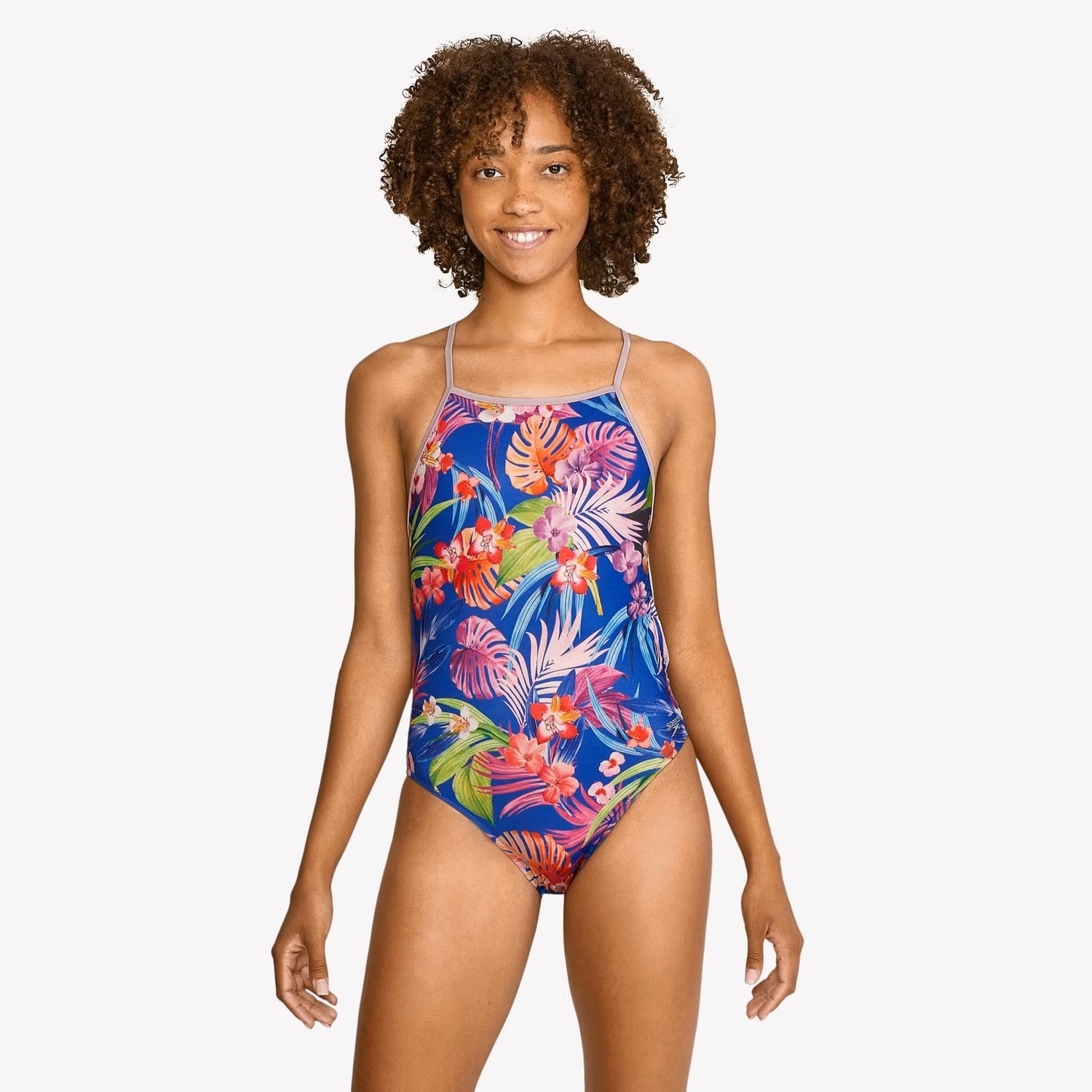 Speedo The One Printed One Piece Swimsuit - A blue swimsuit with a tropical floral pattern and thin straps.